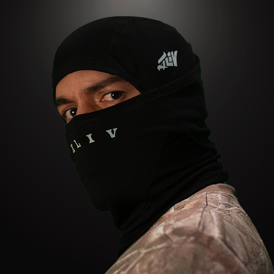 black ski mask being worn by model. 44 logo on side with XLIV in front on nose area
